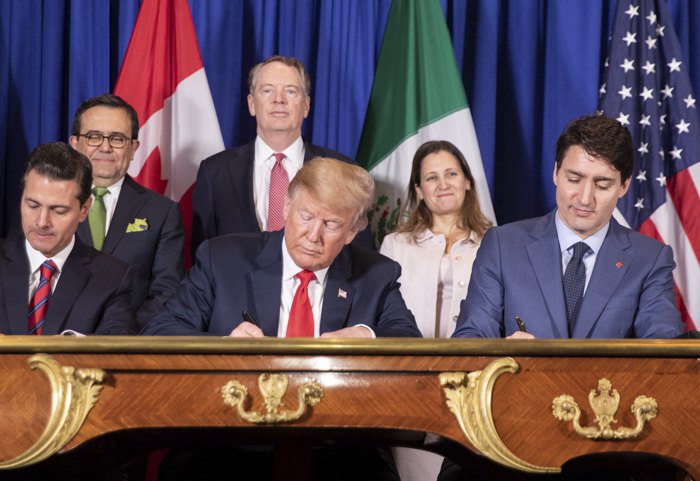 Главы Мексики, США и Канады подписывают USMCA в ноябре 2018.