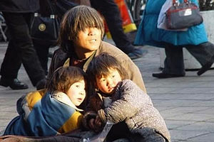 В КНР - более 100 млн бедняков