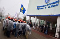 Люди в масках пикетировали Дарницкое РОВД и Днепровскую райадминистрацию