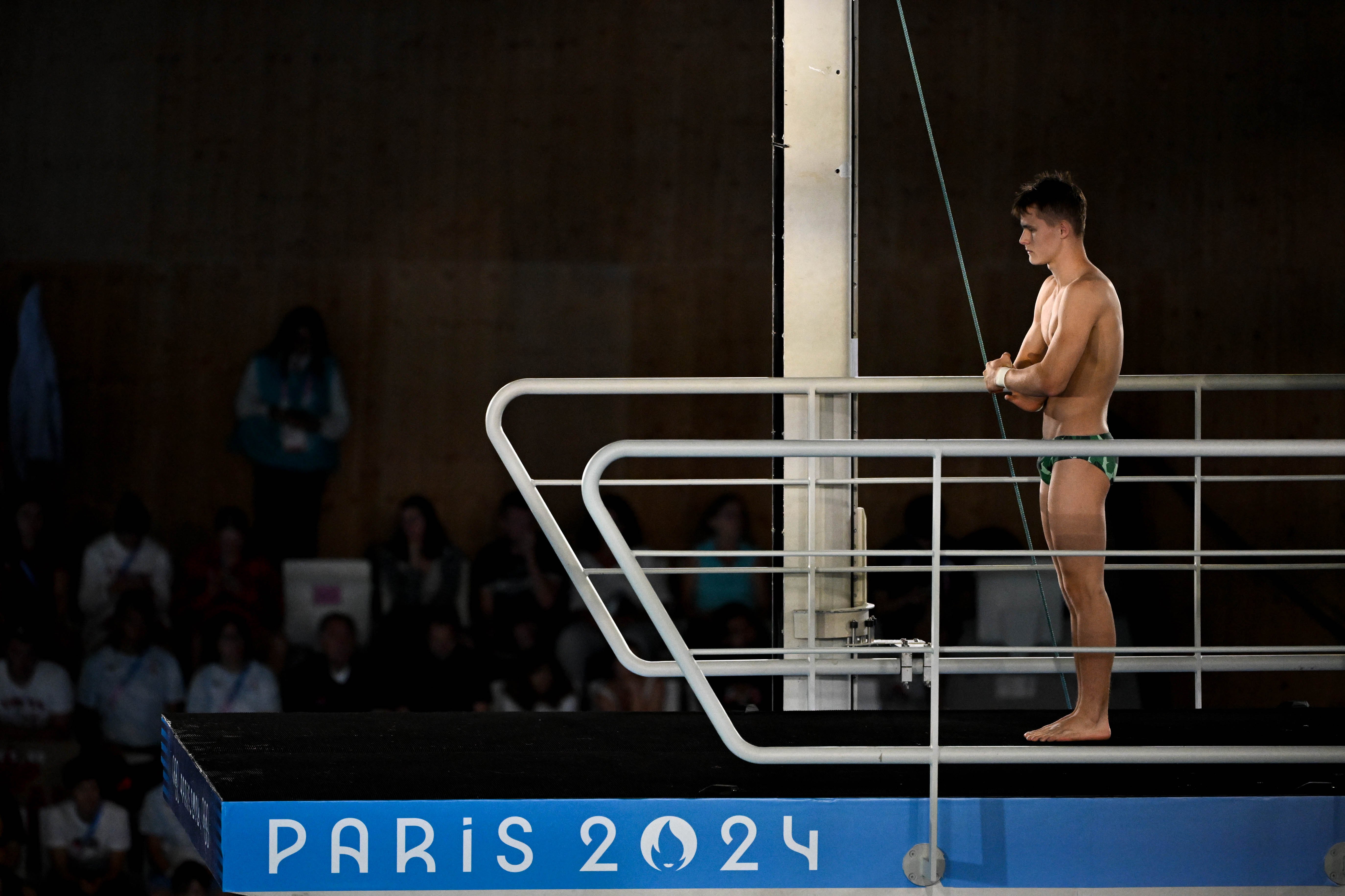 Олексій Середа готується до виконання стрибка на Олімпіаді-2024.