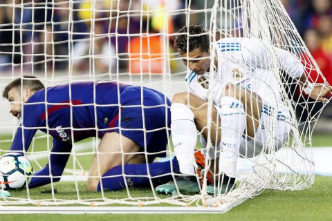 Травмированному в матче с "Барселоной" Роналду поставили диагноз