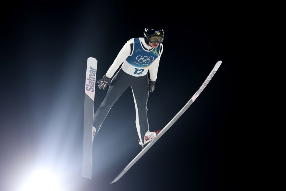 Калініченко під час стрибка на ОІ-2026 в Італії