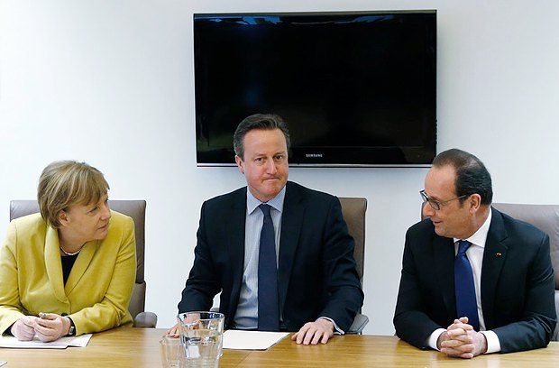 Канцлер Германии Ангела Меркель, премьер- министр Великобритании Дэвид Кэмерон и президент Франции Франсуа Олланд во время
двухдневного саммита в Брюсселе