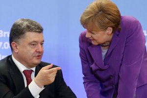 Порошенко обсудил с Меркель финансовую помощь Донбассу