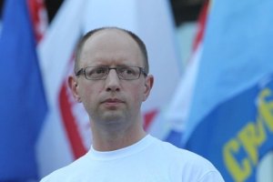 Яценюк назвал организатора драки на митинге оппозиции в Киеве