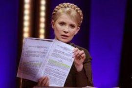 Тимошенко призывает мир отреагировать на изменения к закону о выборах