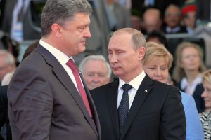 Путин и Порошенко обсудили возможное прекращение огня