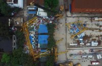 У Китаї обвалився вантажопідйомний кран, 18 загиблих