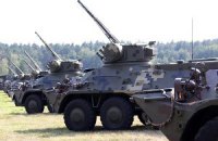 Наблюдатели ОБСЕ заметили на Донбассе немаркированную военную технику