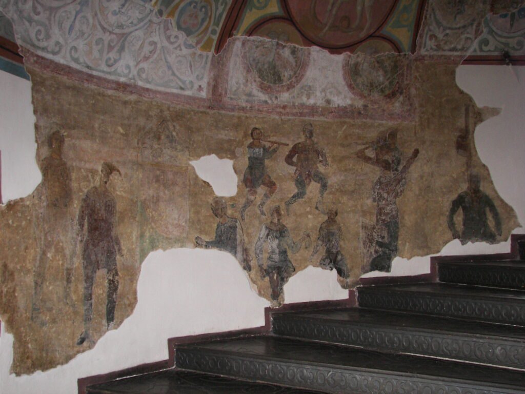 Зображення скоморохів на фресці південної вежі Софії Київської.