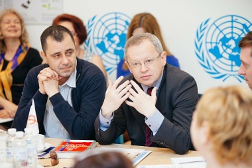 Владимир Жовтяк и Яцек Тишко, директор ЮНЕЙДС Украина