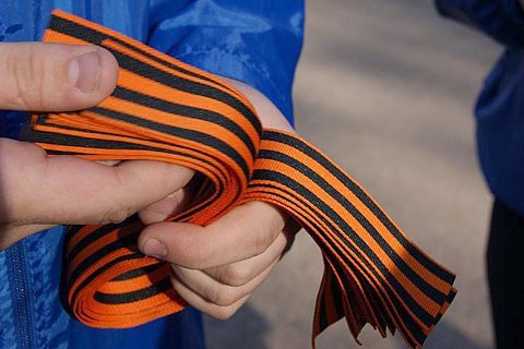 Спортсменам з РФ замість національного прапора на Олімпіаді запропонували використовувати георгіївські стрічки
