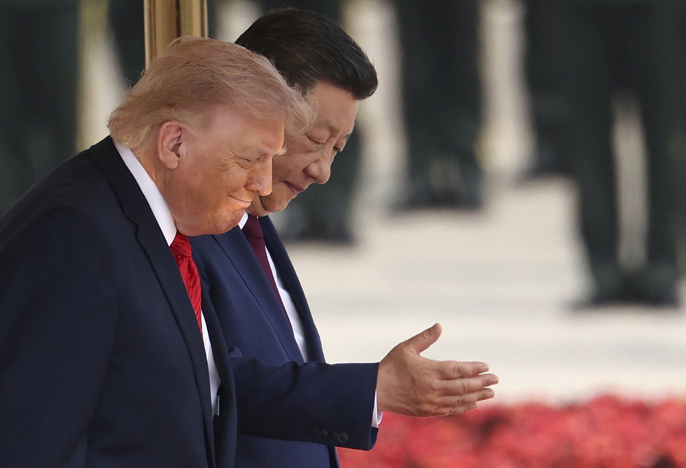 Лідер Китаю Сі Цзіньпін та президент США Дональд Трамп у Великому залі народних зборів, 14 травня 2026 року