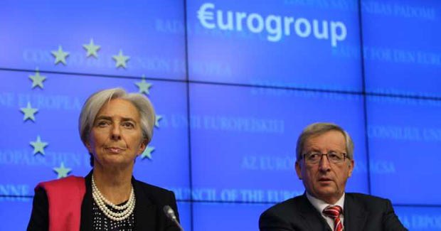 Управляющий директор МВФ Кристин Лагард и руководитель Еврогруппы (группы министров финансов европейских стран) Жан-Клод Юнкер
защищают единую валютную зону