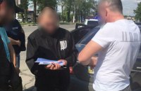 ​Сотрудника прокуратуры Мелитополя задержали при получении $10 тыс. от предпринимателя