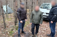 Суд відправив під варту начальника відділу Дарницького управління ГУНП, якого знайшли в лісі з вкраденими грошима