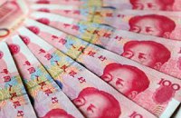Китай знову девальвував юань
