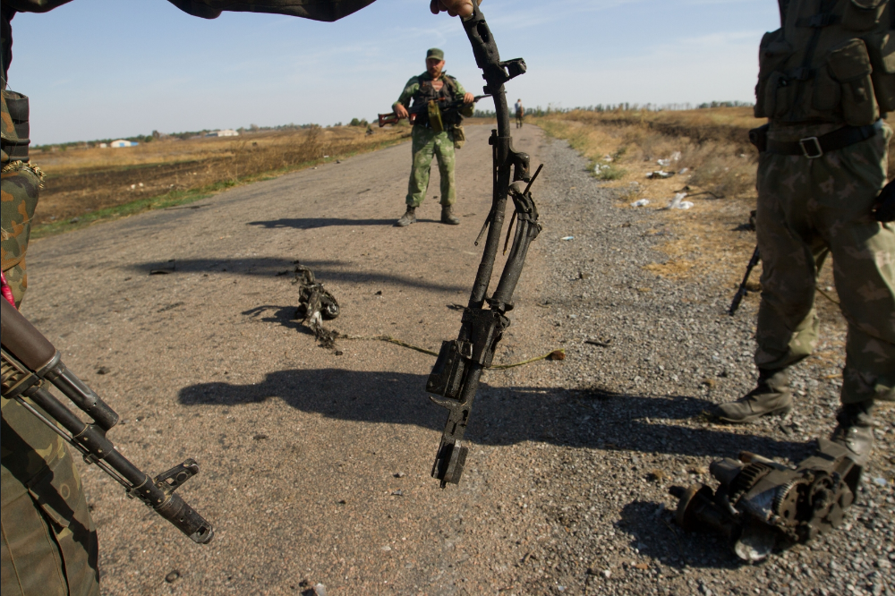 На месте расстрела украинских военных в &quot;зеленом коридоре&quot;, неподалеку Новокатериновки. Сентябрь 2014 года