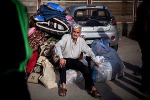 Турция выдаст сирийским беженцам временные удостоверения на работу