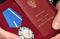 Путин наградил орденом погибшего во "Внуково" президента Total