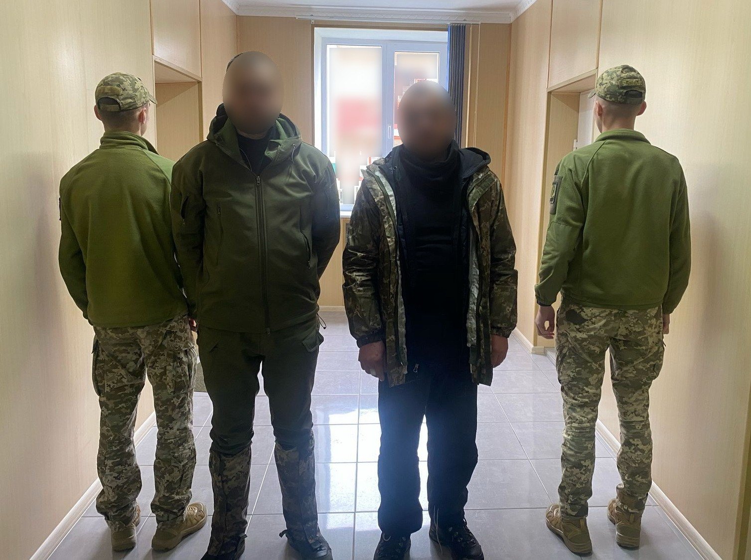 Затримані чоловіки