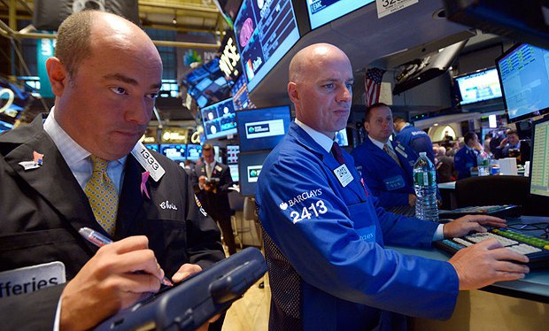Трейдеры на Нью-йоркской фондовой бирже 1 октября 2013 г.