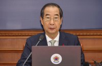 Експрем’єр-міністра Південної Кореї Хан Док Су засудили до 23 років ув’язнення у справі про введення воєнного стану