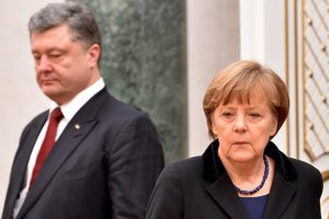 Порошенко и Меркель настаивают на освобождении всех заложников