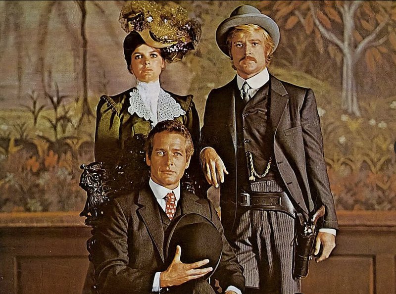 Пол Ньюман (сидить), Кетрін Росс і Роберт Редфорд у фільмі «Буч Кессіді та Санденс Кід» (1969), режисер Джордж Рой Гіл