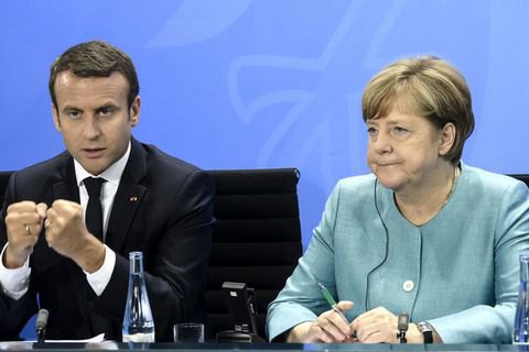 Меркель і Макрон закликали Путіна і Порошенка забезпечити припинення вогню