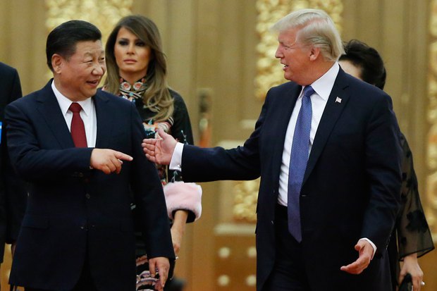 Президент США Дональд Трамп и президент Китая Си Цзиньпин во время встречи в Пекине, 09 ноября 2017.