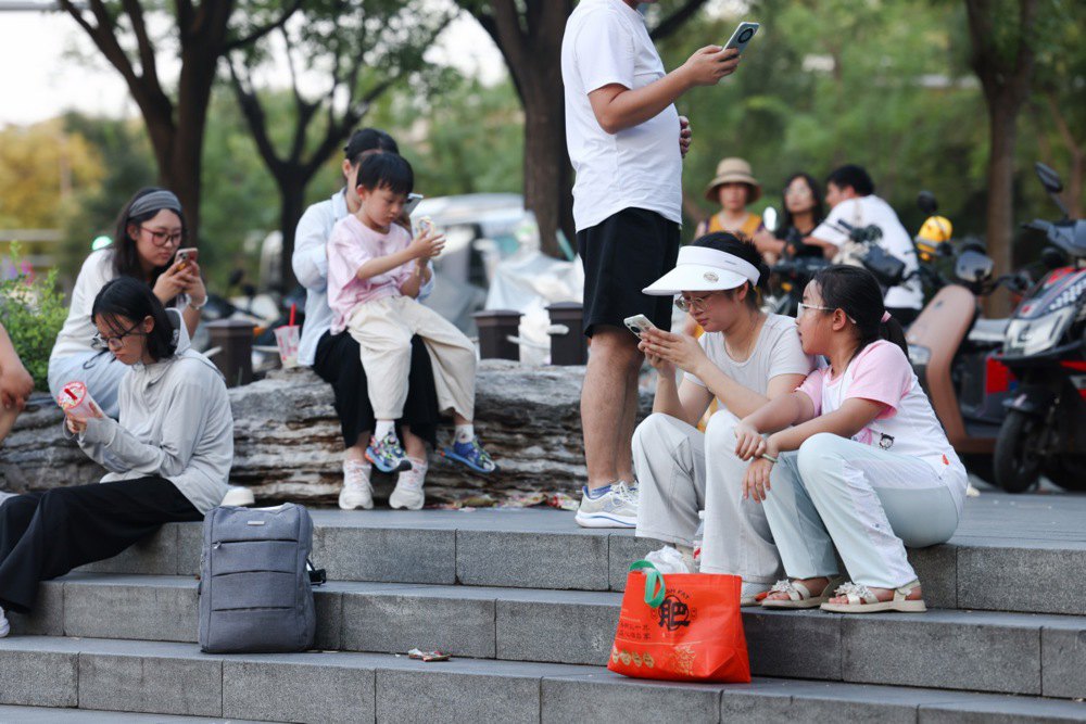 Туристи в Пекіні, Китай, 7 серпня 2025 року.