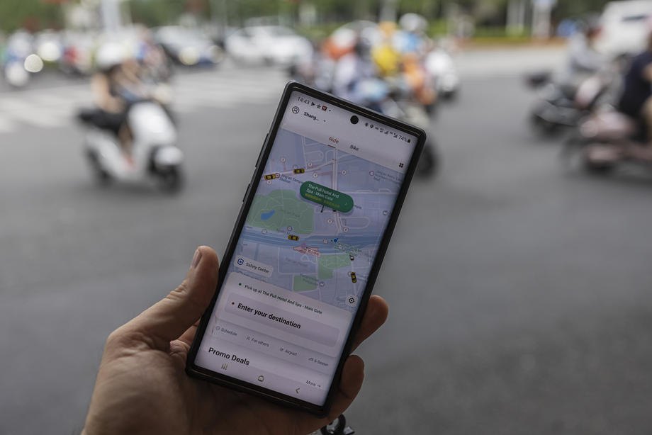 Запущений на смартфоні мобільний додаток для виклику таксі Didi Chuxing