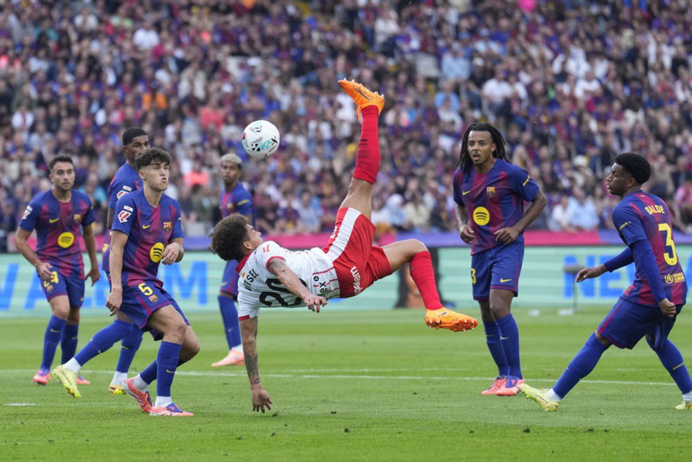 Аксель Вітцель під час удару