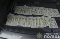 Поліція запобігла постачанню в Україну 1 мільйона фальшивих доларів 