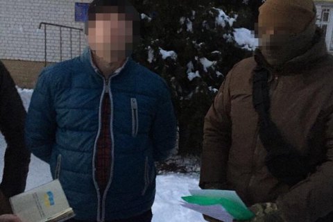 В Киевской области майор полиции задержан при получении 5 тыс. гривен взятки