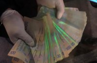 Двух полицейских будут судить за вымогательство 250 тыс. грн несуществующего долга 
