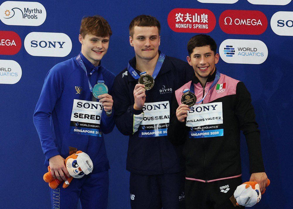 Трійка кращих. По центру австралієць Кассель Руссо