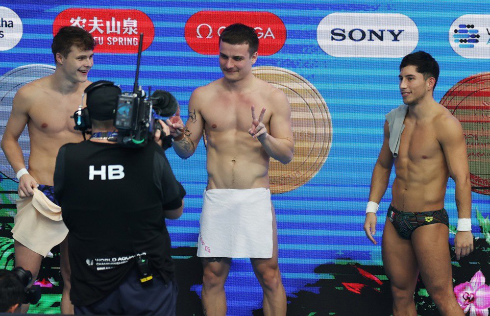 Призери ЧС. Олексій Середа ліворуч