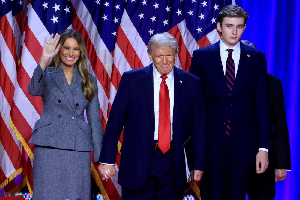 Donald Trump along with his wife Melania Trump and their son Barron Trump during a speech in West Palm Beach, Florida, USA, 6 November, 2024