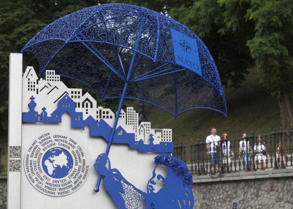 Sculptural composition commemorating the 75th anniversary of the founding of the North Atlantic Treaty Organisation — ‘Ukrainian girl under NATO umbrella’ in Kyiv, 2 July 2025.
