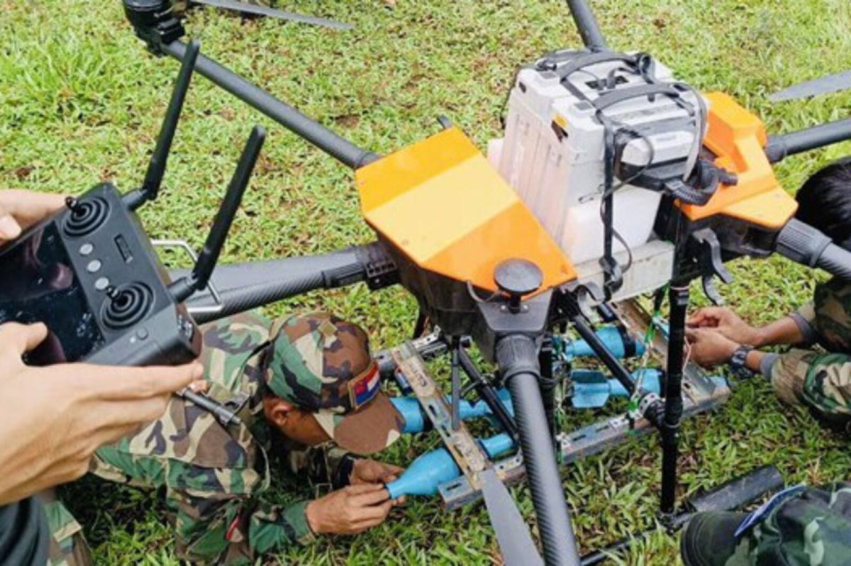  Members of the Cloud Wings group prepare a drone for combat in south-eastern Myanmar, March 2023