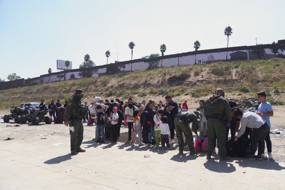US Border Patrol detains undocumented migrants at the southern border in San Diego, California, 25 September 2023 