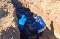 Over 60 people buried in mass grave in Bucha
