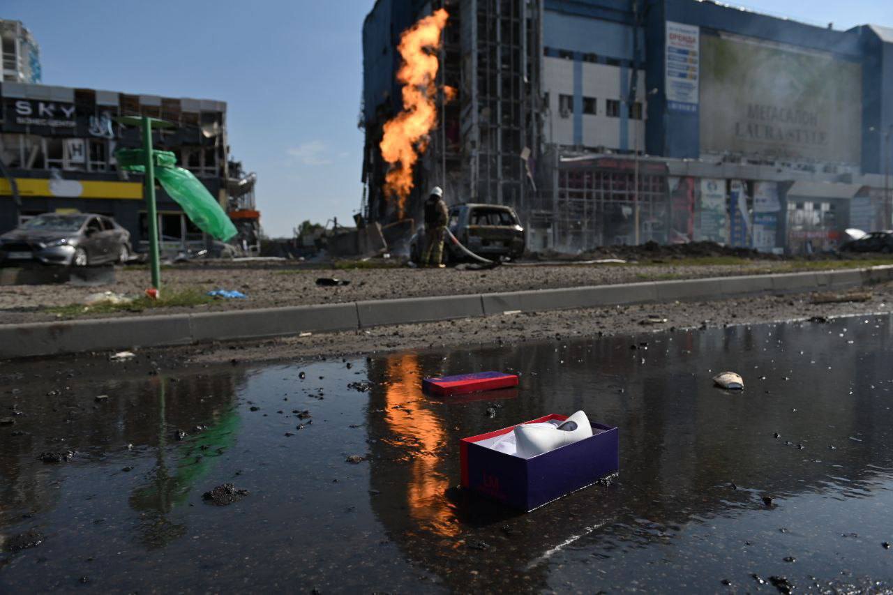 Rescuers at the site of the shelling of Kharkiv on 1 September, 2024