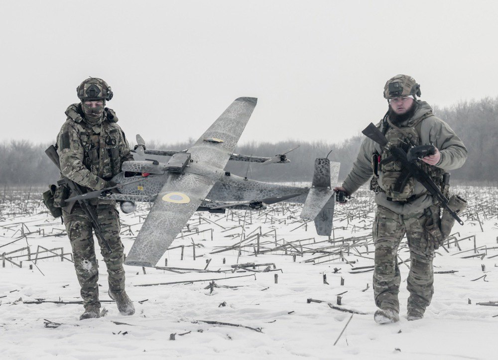  Ukrainian military personnel prepare to launch a GARA drone for aerial reconnaissance near the front line, 23 January 2026.