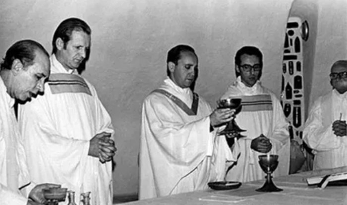 Jorge Mario Bergoglio (centre) during a service, Argentina, 1976.