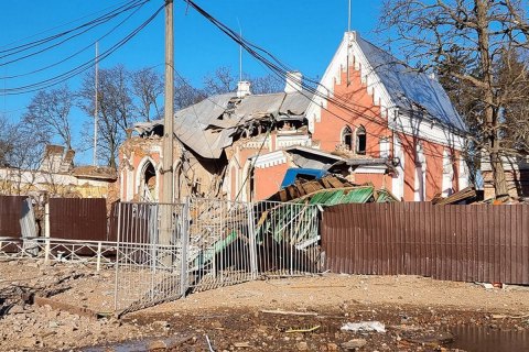 Rescuers pull the bodies of 4 dead residents out of the rubble in the Chernihiv region