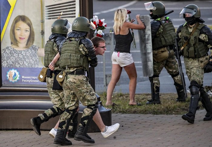 Belarusian military special forces detain a man during a protest rally in Minsk