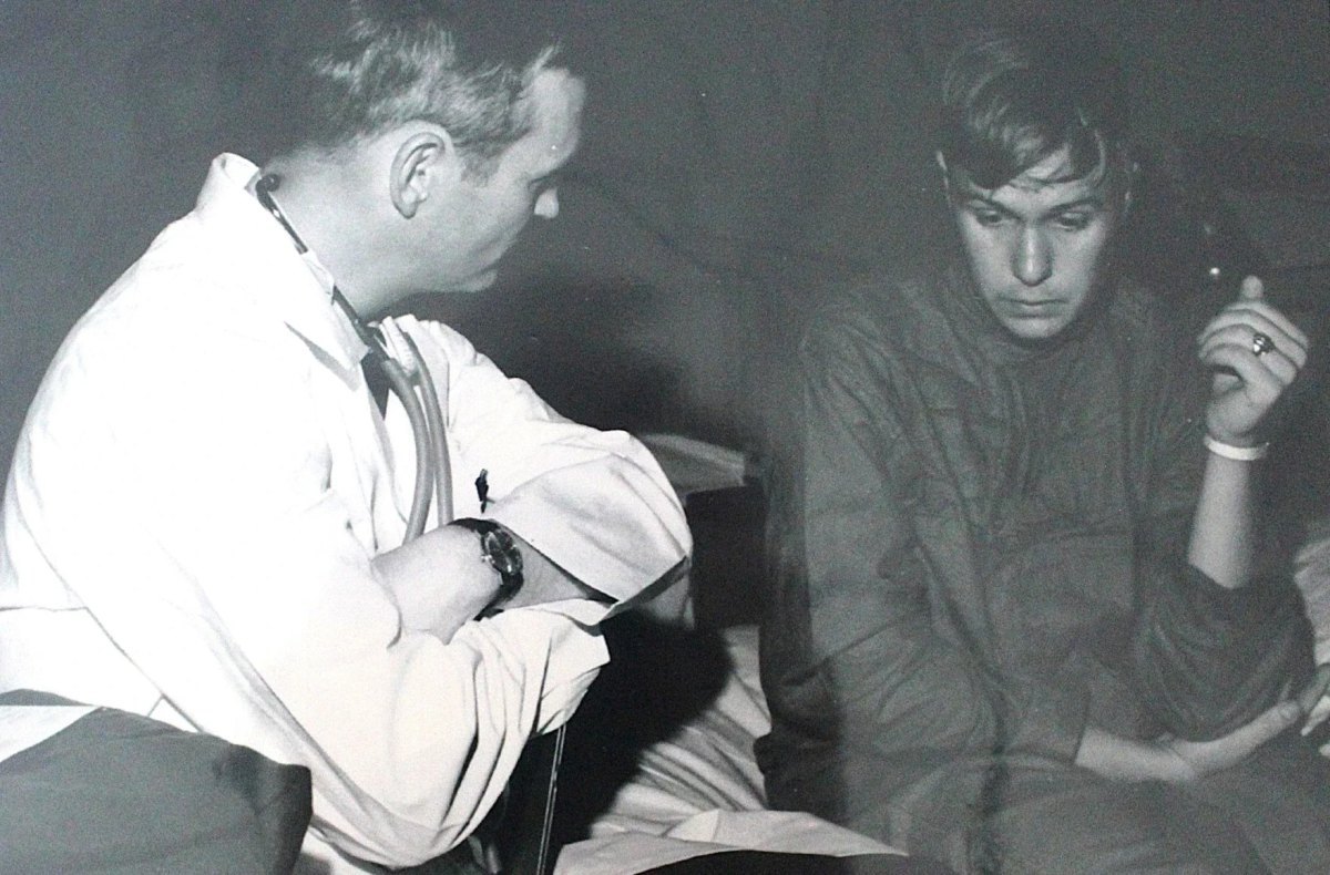 American soldier Steve Volk speaks with a medical officer at an evacuation hospital in Seoul, South Korea, after being released by the North Koreans. Volk says he lost 25kg during captivity.
